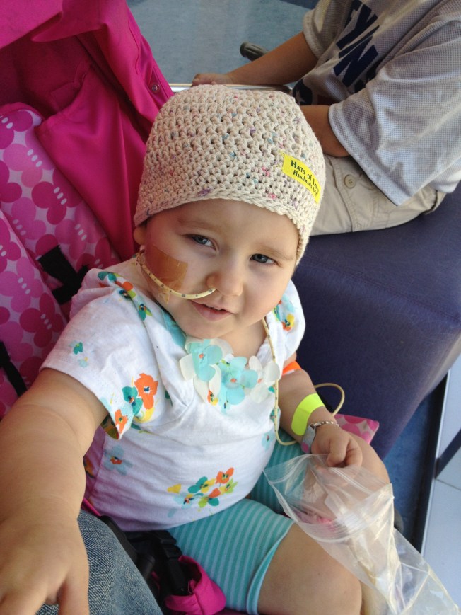 Phoebe gets a new hat in the clinic waiting room