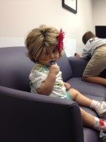 Phoebe wearing a fun little wig we found at a thirft store.