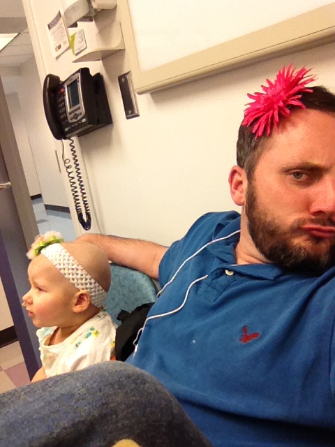Phoebe and daddy wait in the clinic to be admitted
