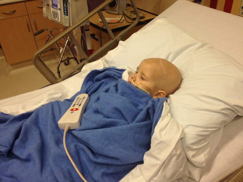 Phoebe watches cartoons after being admitted