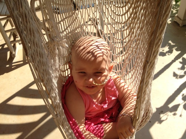 Phoebe relaxes on the porch